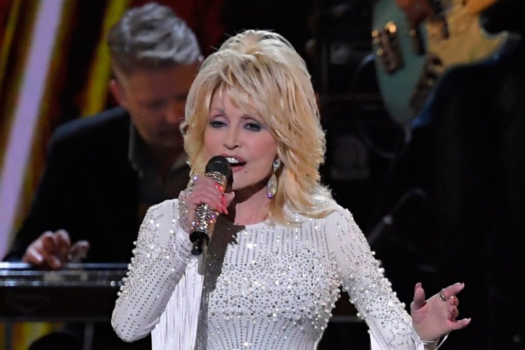 Dolly Parton’s Dollywood says it will pay all tuition costs for employees pursuing higher education